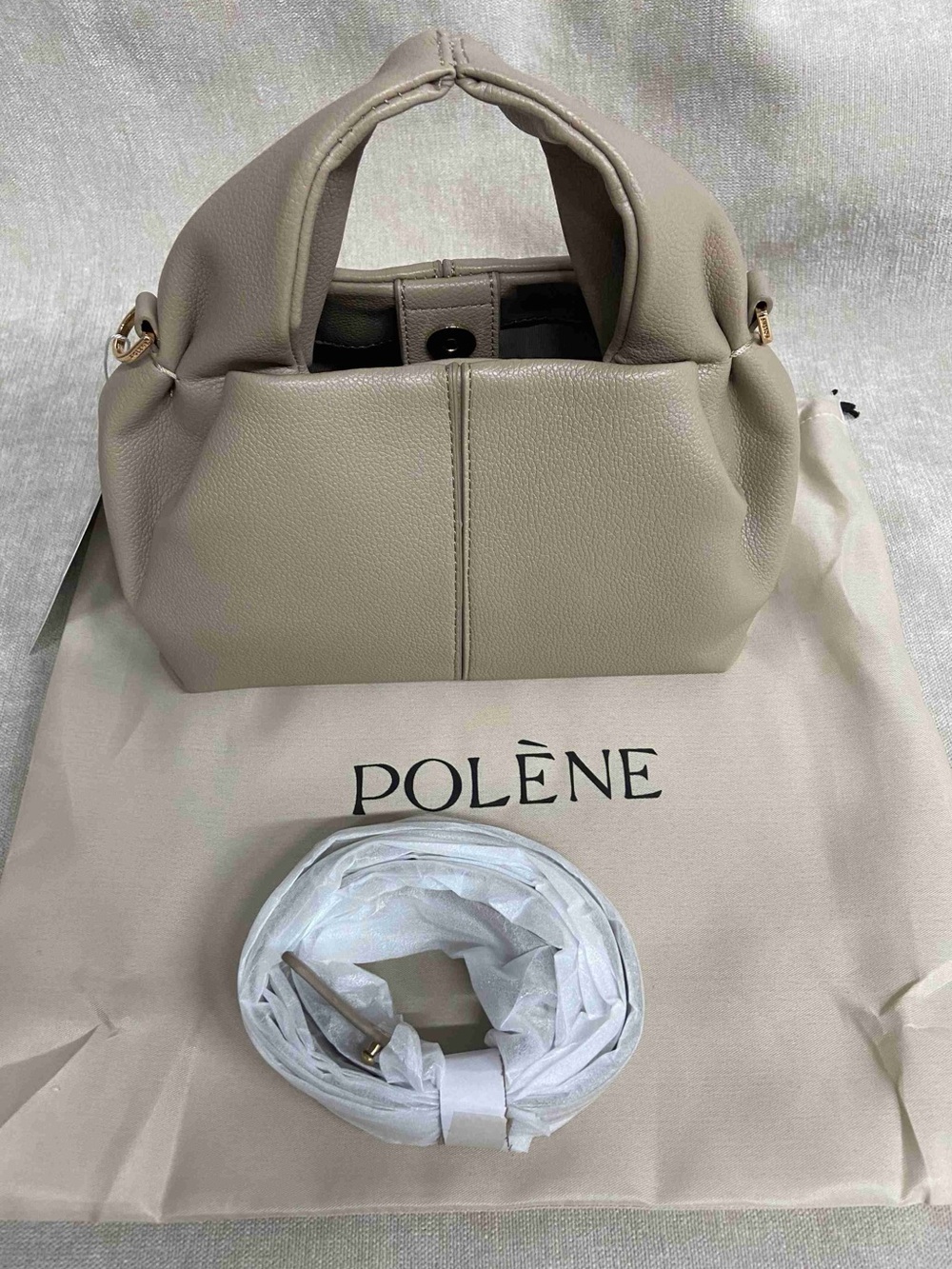 Polène small top-handle bag in taupe